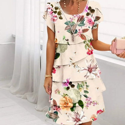 Vestido en cascada con motivos florales y varias plantas