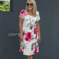 Vestido en cascada con motivos florales y varias plantas